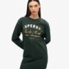 Abito in jersey con logo metallico di lusso