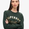 Abito in jersey con logo metallico di lusso