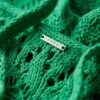 Abito lungo con scollo all’americana in maglia all’uncinetto