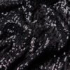 Abito midi con paillettes e schiena scoperta