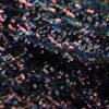 Abito midi con paillettes e schiena scoperta