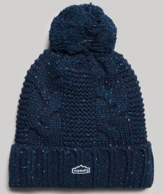 Berretto con pompon a trecce