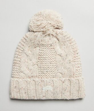 Berretto con pompon a trecce
