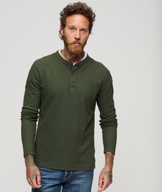 Maglia a maniche lunghe con mezzo bottone e trama a nido d’ape