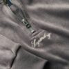 Maglia in velluto Country Club con mezza zip Maglia in velluto Country Club con mezza zip