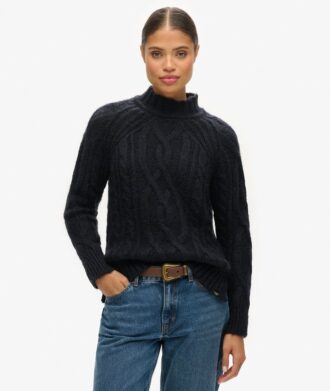 Maglione a collo alto in maglieria con lavorazione a trecce