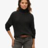 Maglione morbido a collo alto con trecce Maglione morbido a collo alto con trecce