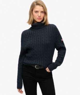 Maglione morbido a collo alto con trecce