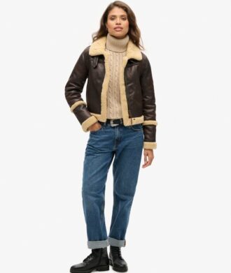 Maglione morbido a collo alto con trecce