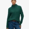Maglione morbido a collo alto con trecce