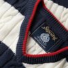 Maglione oversize a righe con collo a V e trecce Maglione oversize a righe con collo a V e trecce