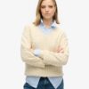Maglione oversize con collo a V e lavorazione a trecce