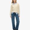 Maglione oversize con collo a V e lavorazione a trecce