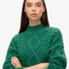 Maglione polo con lavorazione a trecce Aran