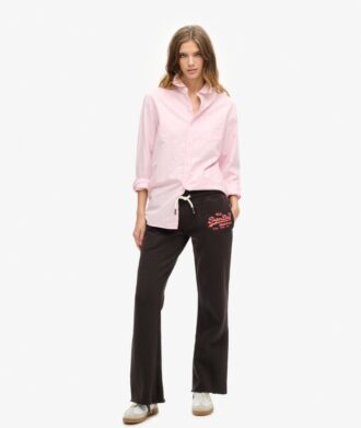 Pantaloni jogger a vita bassa svasati con logo Vintage neon