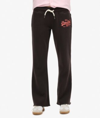 Pantaloni jogger a vita bassa svasati con logo Vintage neon