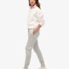 Pantaloni jogger slim con logo metallico di lusso