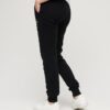 Pantaloni jogger slim con logo metallico di lusso