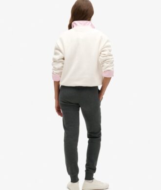 Pantaloni jogger slim con logo metallico di lusso
