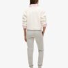 Pantaloni jogger slim con logo metallico di lusso