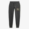 Pantaloni jogger slim con logo metallico di lusso