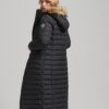 Puffer lungo imbottito leggero con cappuccio in pelliccia sintetica