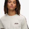 T-shirt a righe retrò con logo Essential T-shirt a righe retrò con logo Essential