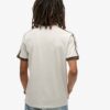 T-shirt a righe retrò con logo Essential T-shirt a righe retrò con logo Essential