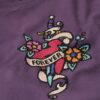 T-shirt aderente con piccolo tatuaggio in strass T-shirt aderente con piccolo tatuaggio in strass