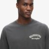 T-shirt ampia con grafica sul retro T-shirt ampia con grafica sul retro