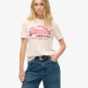 T-shirt comoda con logo metallico