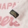 T-shirt comoda con logo metallico