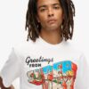 T-shirt con grafica “Travel Postcard” T-shirt con grafica “Travel Postcard”