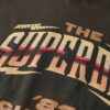 T-shirt con maniche ad aletta in stile rock band anni ’70