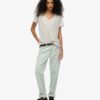 T-shirt con scollo a V ricamata