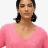 T-shirt con scollo a V ricamata