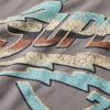 T-shirt con stampa rock anni ’70