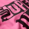 T-shirt punk con maniche ad aletta e decorazioni