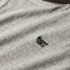 T-shirt raglan con logo Essential in Organic Cotton