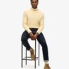 The Merchant Store – Maglione a collo alto con trecce
