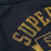 Top a canotta con stampa Athletic College
