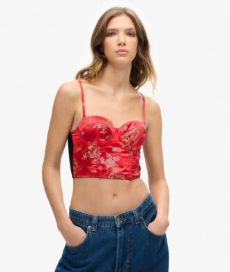 Top a corsetto con ricami floreali in raso