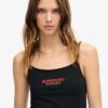 Top a spalline aderente con logo Sportswear