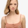 Top a spalline con bottoni Athletic Essentials