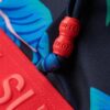 Top bikini a triangolo con logo