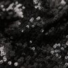 Top con paillettes, collo a cappuccio e scollo all’americana
