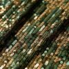 Top con scollo a cappuccio e paillettes