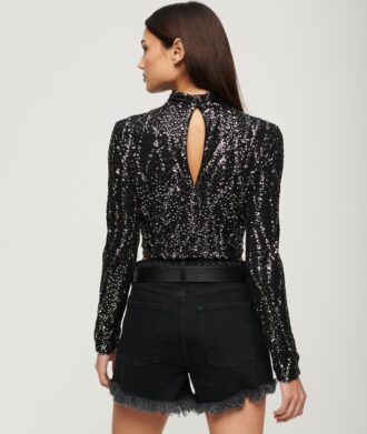 Top corto a maniche lunghe con paillettes