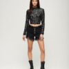 Top corto a maniche lunghe con paillettes