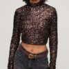 Top corto a maniche lunghe con paillettes